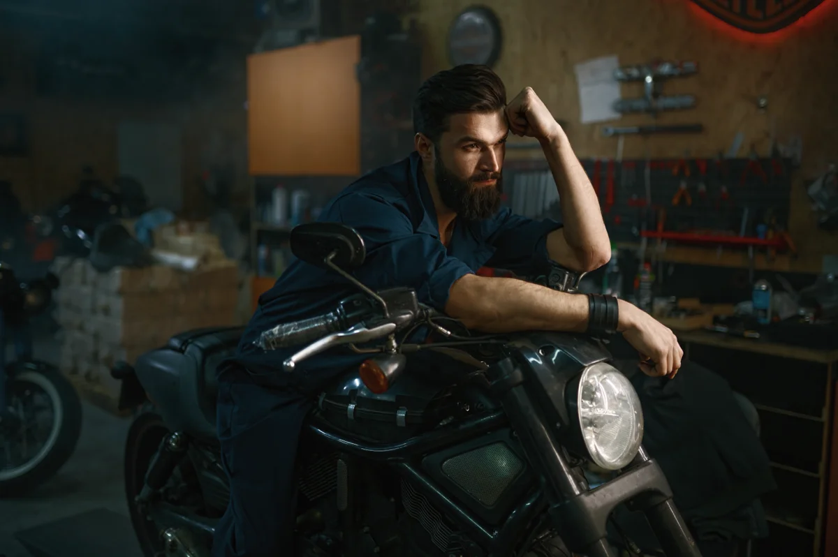 Portrait Of Brutal Man Mechanic Sitting On Repaire 2023 11 27 05 16 18 Utc X 1200